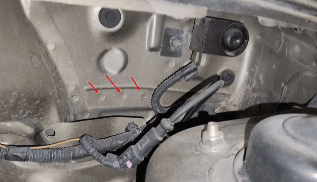 welding spots in car engine bay