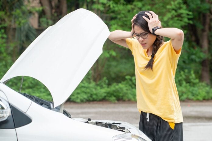 woman stress car broke down