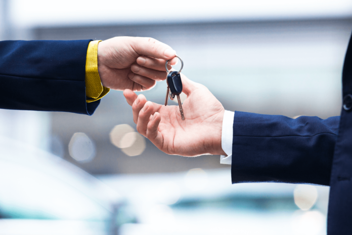Buyer receiving car keys