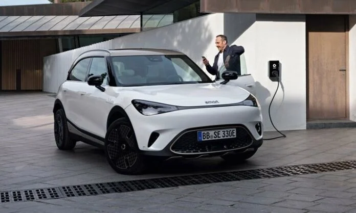 Smart #1 electric car charging outside the house