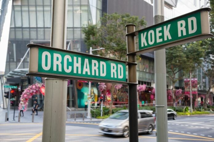 Street sign in Singapore that says Orchard Road