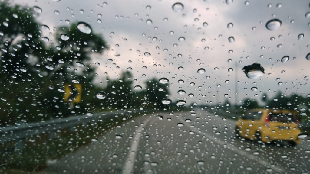 Raindrops on the windshield of the car
