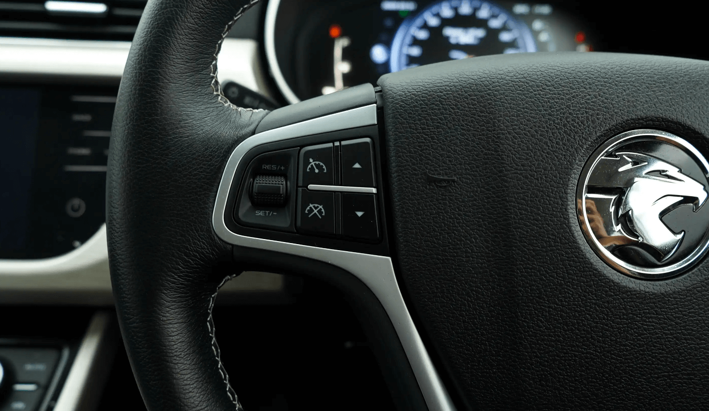 cruise control button with speedometer icon